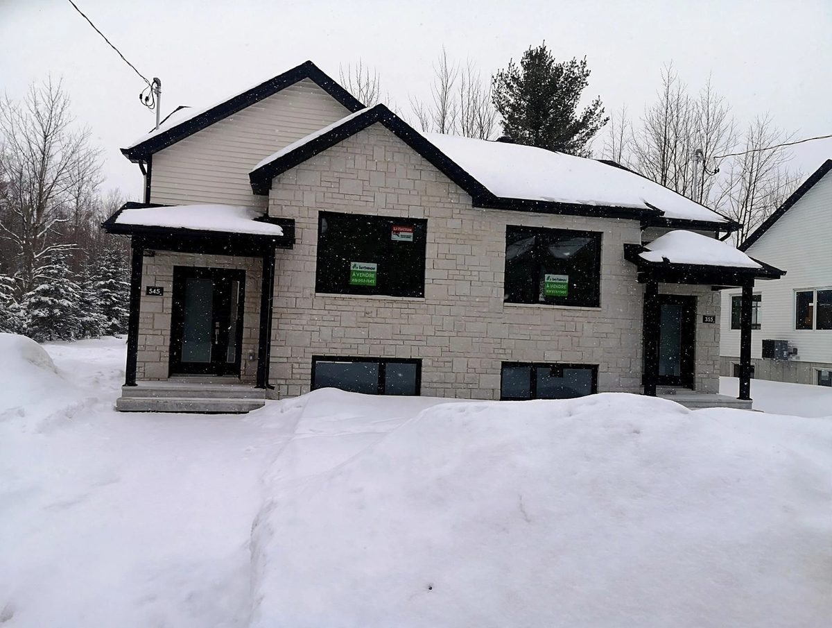 Maison jumelée neuve inspectée avant la prise de possession